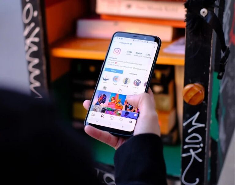 person using insta in phone
